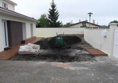Devanture de la maison à l'état brut
