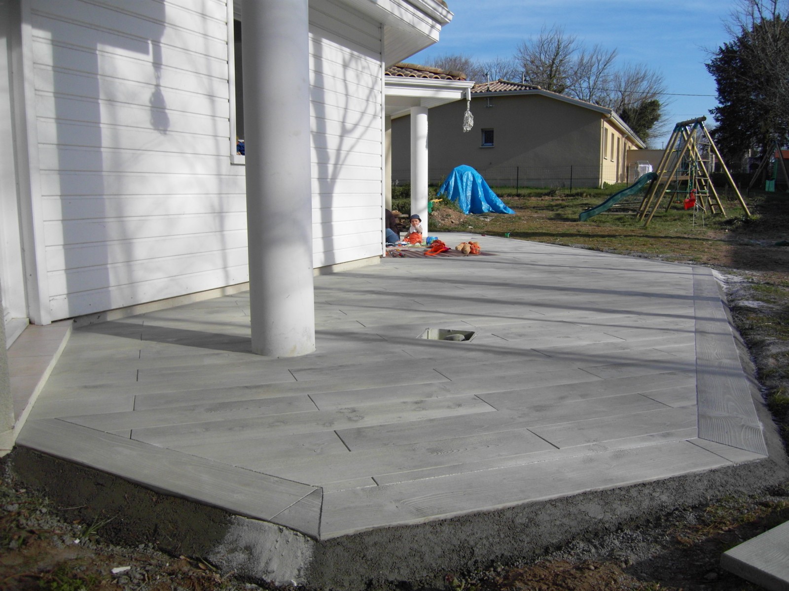 Carrelage imitation bois pour cette terrasse